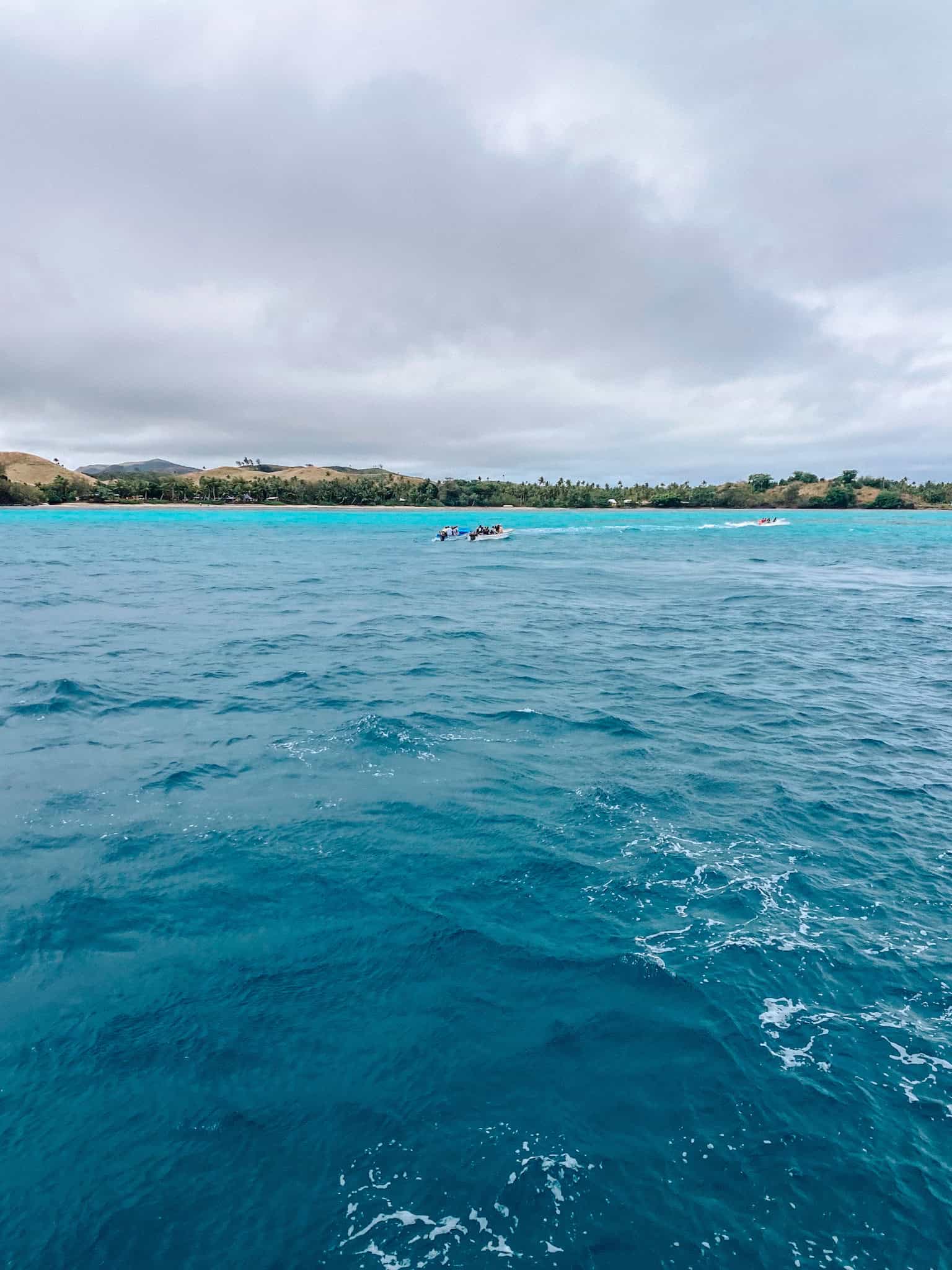 resort boats leaving yasawa islands ferry