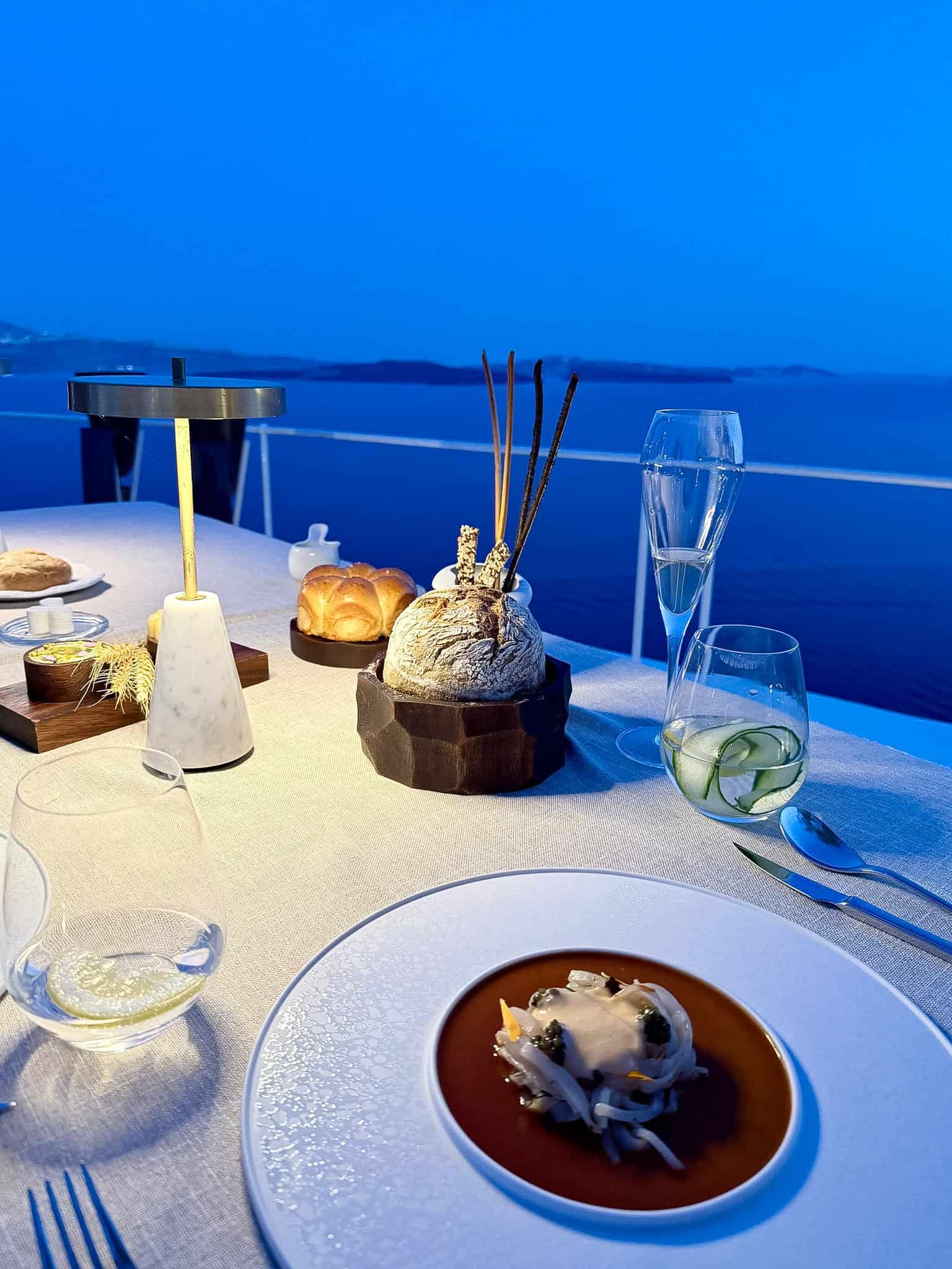 Lycabettus tasting menu course with view from balcony