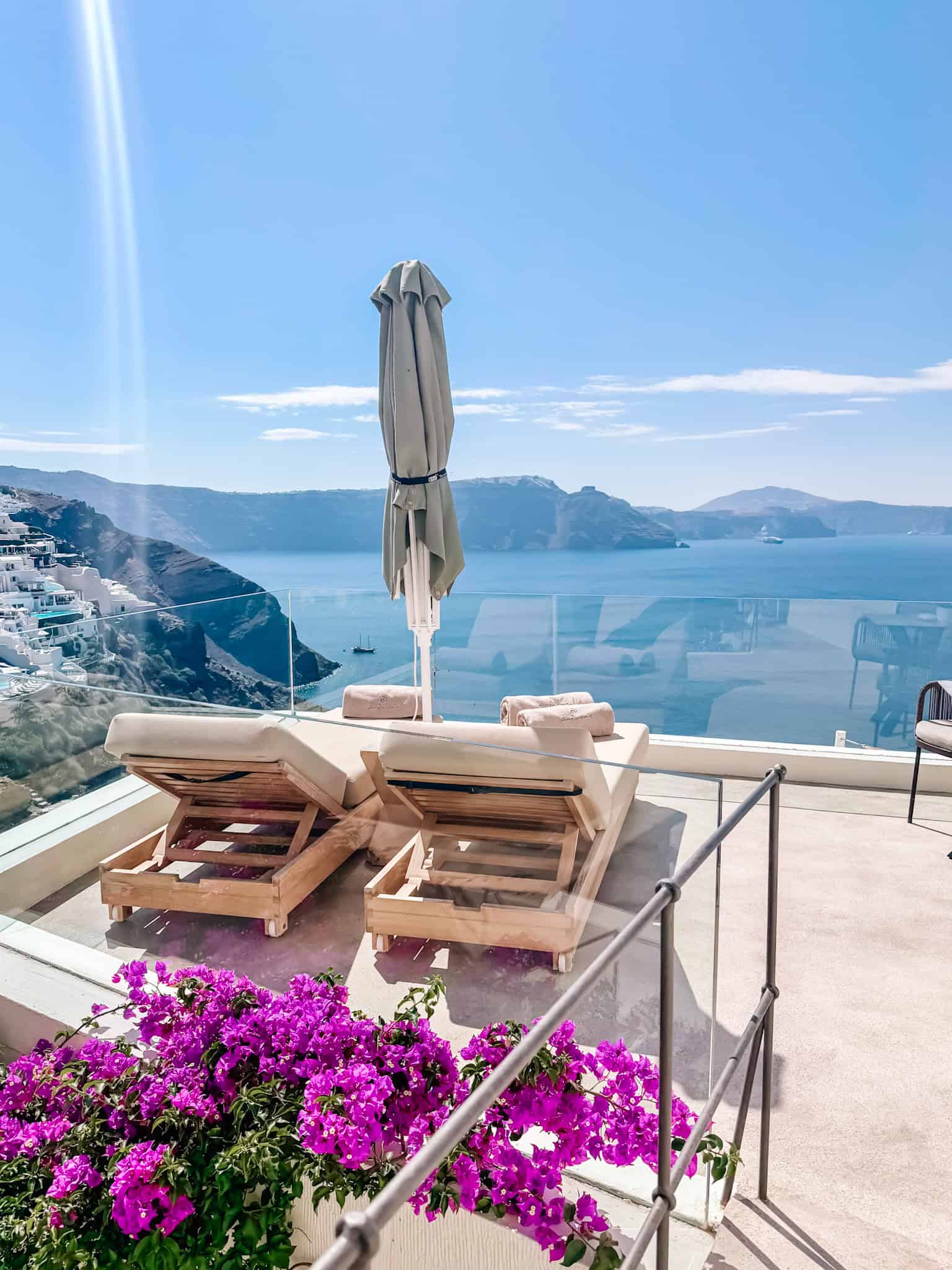 view from private outdoor lounge chairs at Andronis Luxury Suites in Santorini